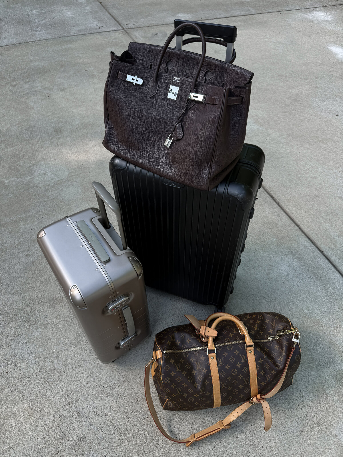 Travel bags styled with neutral luggage