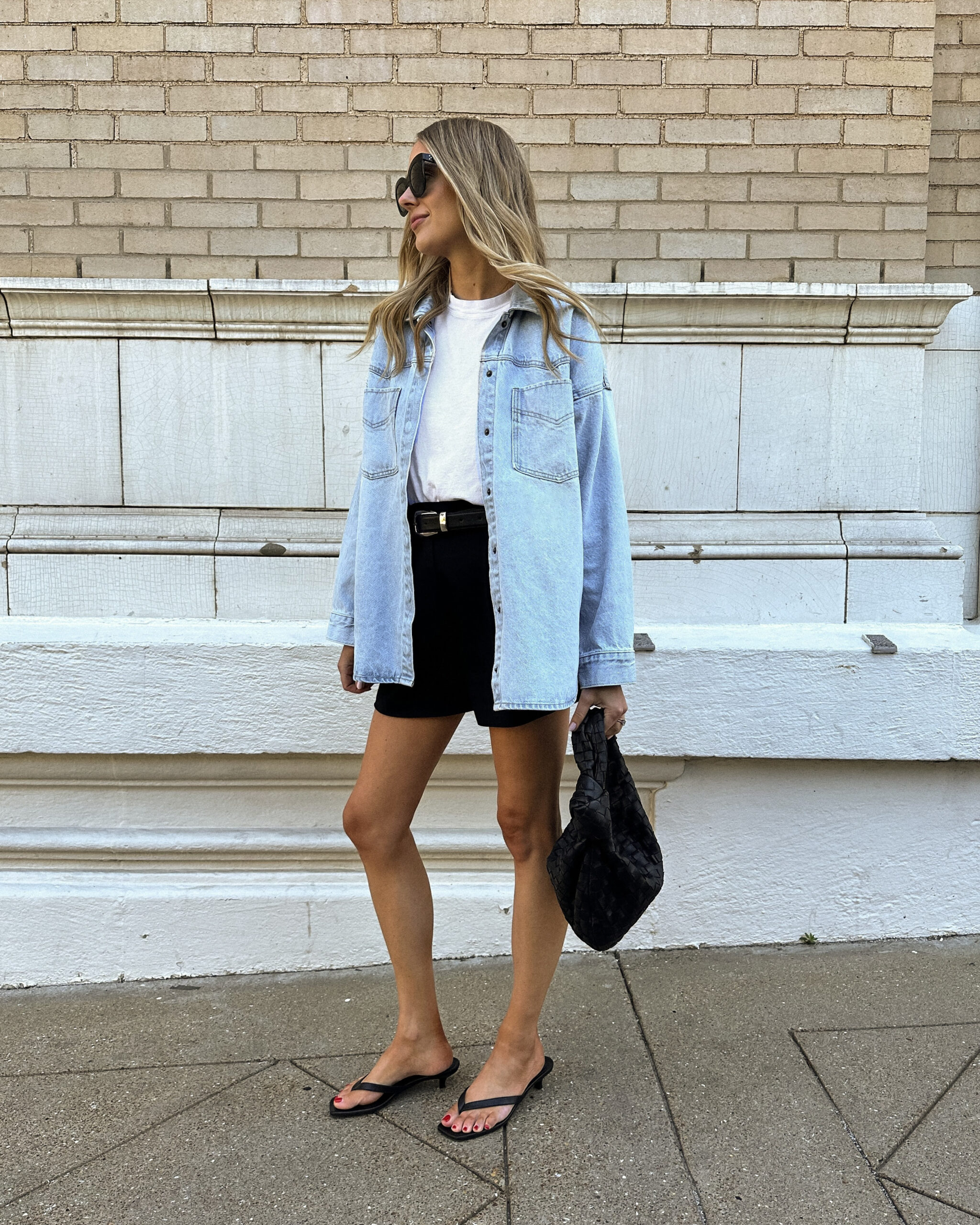 A blue overshirt paired with black shorts